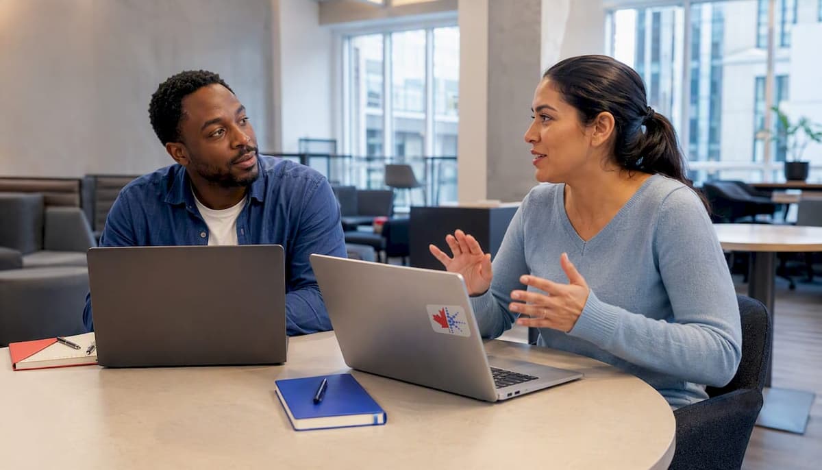 Colleagues practicing workplace listening in meeting room